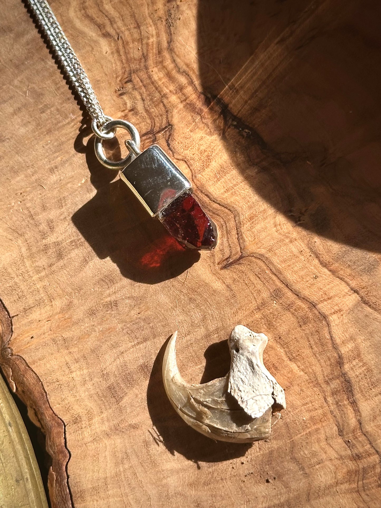 maroon zircon crystal pendant
