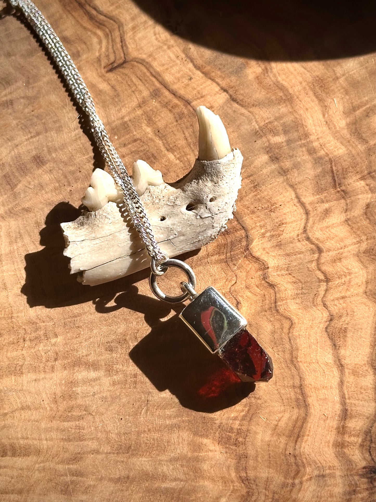 maroon zircon crystal pendant