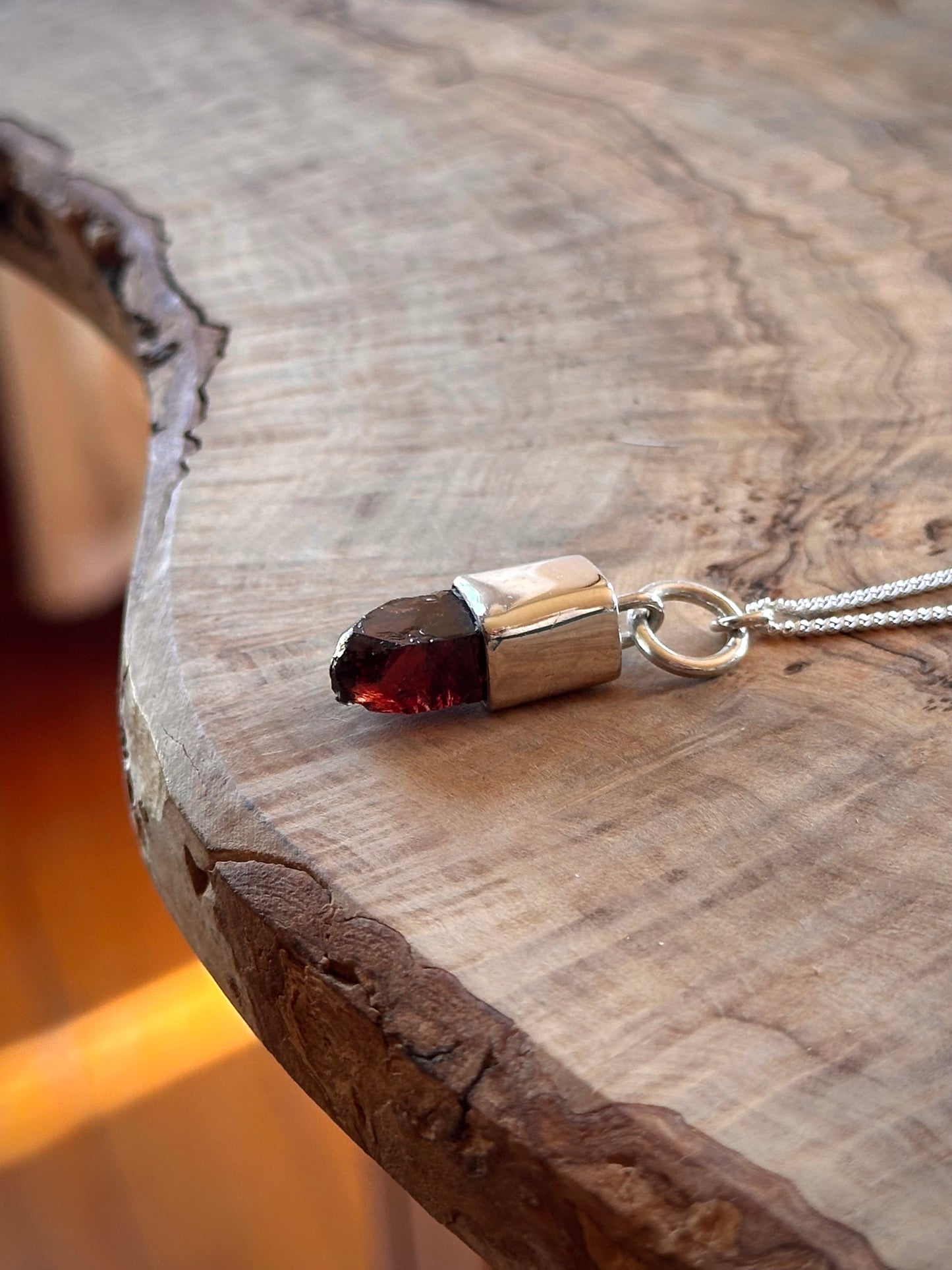 maroon zircon crystal pendant